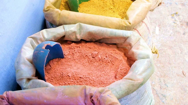 Fumed alumina for powder flowability and no electrostatic charging.